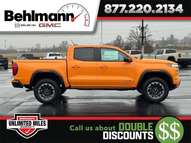 2026 GMC Canyon 4WD Crew Cab AT4 in Desert Sun — front three-quarter view